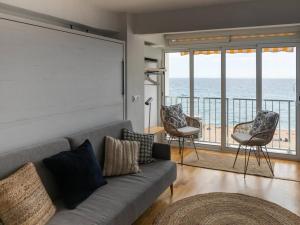 Posedenie v ubytovaní Apartamento con vistas increíbles al mar