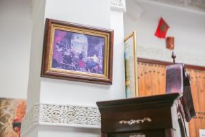 TV a/nebo společenská místnost v ubytování Riad Fes Basma