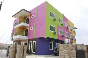 a multicolored building with at Alor Villa in Malacca