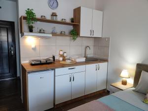 A cozinha ou kitchenette de Adonis