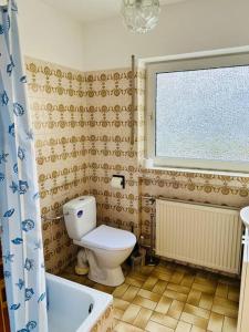 Ένα μπάνιο στο Ferienwohnung in Rheinnähe