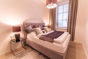Postel nebo postele na pokoji v ubytování Apartmány Mia Valtice