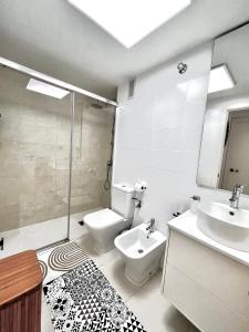 Koupelna v ubytování Bonito apartamento en la playa