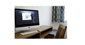 Televízia a/alebo spoločenská miestnosť v ubytovaní Astellina hotel-apart