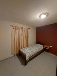 Ένα ή περισσότερα κρεβάτια σε δωμάτιο στο Casa Cone