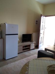 TV a/nebo společenská místnost v ubytování Maria's House 2
