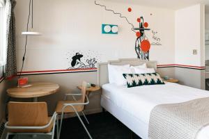 Postel nebo postele na pokoji v ubytování Mesa Verde Motel