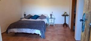 A bed or beds in a room at Montana Retreat