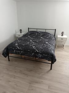 Posteľ alebo postele v izbe v ubytovaní Le gîte du puits