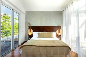 Voodi või voodid majutusasutuse Villa Hanna Green Cay toas