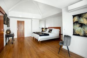 Voodi või voodid majutusasutuse Villa Hanna Green Cay toas
