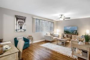 a living room with a couch and a table at Chicago Charm in Chicago