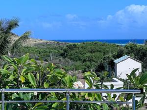 a view of the ocean from a balcony at Villa Taïana in Saint Martin