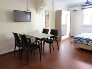 TV a/nebo společenská místnost v ubytování Istanberry - Royal Apartments