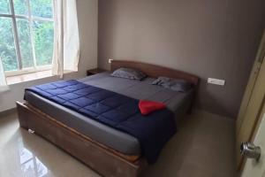 A bed or beds in a room at Furnished Apt near Palolem Beach¶WiFi ¶Forest view