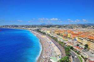 an aerial view of a beach and the ocean at Beau studio tout équipé dans le centre historique in Biot