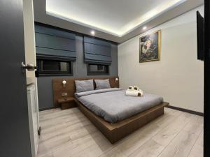 a bedroom with a bed with a toy car on it at NENEHATUN59 BUTİK OTEL in Ankara