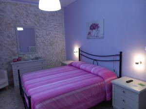 A bed or beds in a room at nAnA'