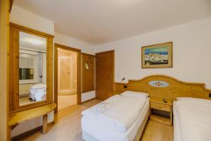 Posteľ alebo postele v izbe v ubytovaní Hotel Rosa Wellness & SPA