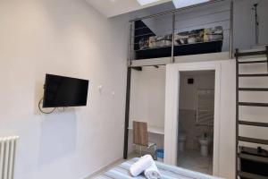 TV a/nebo společenská místnost v ubytování Residence Jolly + 22 fotografií