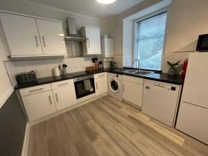 Kuchyň nebo kuchyňský kout v ubytování Strathisla Garden Apartment, Oban