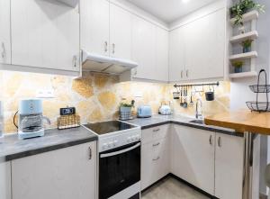 A kitchen or kitchenette at Mai