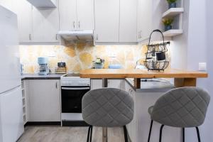 A kitchen or kitchenette at Mai