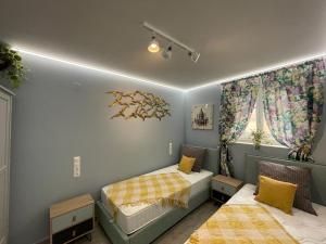 A bed or beds in a room at Mai