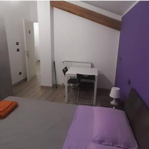 Postel nebo postele na pokoji v ubytování B&B Valle Orco