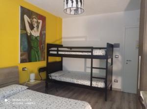 Postel nebo postele na pokoji v ubytování B&B Valle Orco