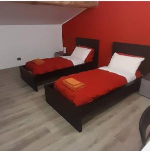 Postel nebo postele na pokoji v ubytování B&B Valle Orco