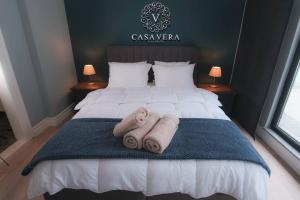 A bed or beds in a room at Casa Vera Sapanca