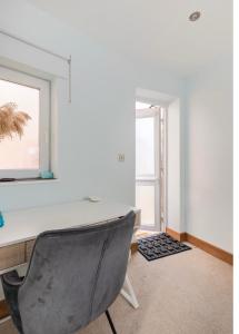an office with a desk and a chair at Razak House in Brighton & Hove
