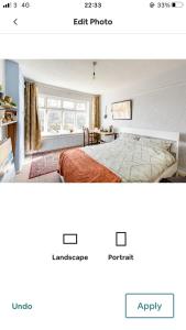 a bedroom with a bed and a room with a window at Birchfields Party House in Manchester