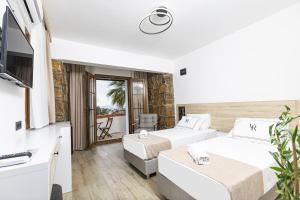 Postel nebo postele na pokoji v ubytování Bodrum Vera Hotel + 35 fotografií
