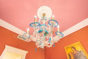a chandelier hanging from a ceiling in a room at Cà Valeri in Venice