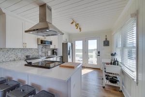 a kitchen with a large island in a room at Holden Beach Home on Intracoastal Waterway Canal! in Holden Beach