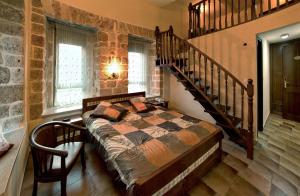Postel nebo postele na pokoji v ubytování Akkotel-Boutique hotel + 18 fotografií
