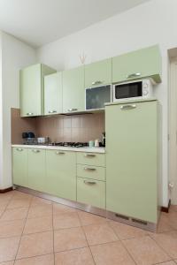 Kuchnia lub aneks kuchenny w obiekcie Exquisite Stay Vannucci- Porta Romana