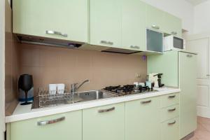 Kuchnia lub aneks kuchenny w obiekcie Exquisite Stay Vannucci- Porta Romana