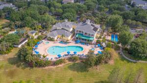 an aerial view of a large house with a swimming pool at Cristina's Tropical Villa/ Just minutes from Disney! in Kissimmee
