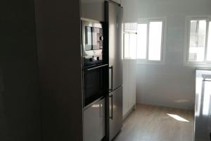 Kuchyňa alebo kuchynka v ubytovaní Apartamento cerca del mar