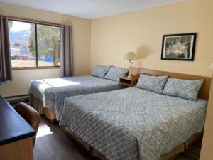 Postel nebo postele na pokoji v ubytování Y-5 Motel
