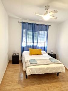 Postel nebo postele na pokoji v ubytování Precioso apartamento en el corazón histórico