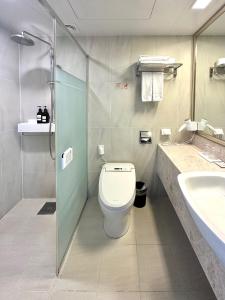 Kylpyhuone majoituspaikassa Mstay Hotel