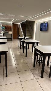 TV a/nebo společenská místnost v ubytování Hotel Pires Faxinal