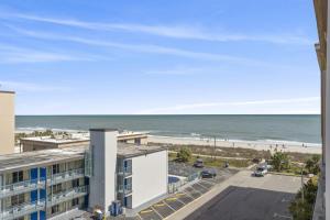 a view of the beach from the balcony of a building at Bali Bay 403 OV Myrtle Beach Hotel Room in Myrtle Beach