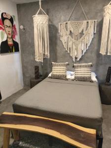 - une chambre avec un lit dans l'établissement San MARTÍN, à Cozumel