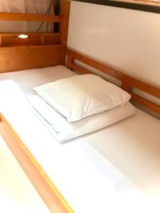 Łóżko lub łóżka w pokoju w obiekcie Guest House Kirara - Vacation STAY 88539
