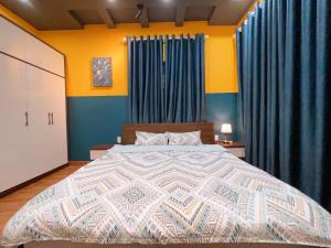 מיטה או מיטות בחדר ב-Là Nhà - Căn hộ và Homestay Hải Phòng - Văn Cao